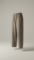 Showcase Luxe Comfort linen pants in a relaxed fit, centered on a neutral-toned background with soft, creating a subtle...